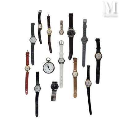 a lot of watches that are sitting together on a white surface