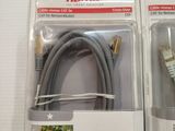 pair of gray and white cables in packaging on a white surface