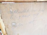a picture of a piece of wood with writing on it