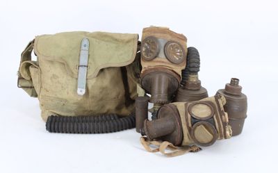 two gas masks and a gas can on a white background