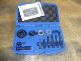 a blue case with tools inside of it on a table