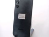 a black phone with a barcode on the back of it