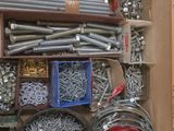 a box full of assorted metal items in it