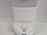 an image of a water dispenser on a white surface