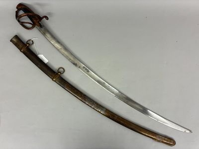 a close up of a pair of swords on a white surface