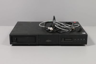 a close up of a dvd player sitting on top of a table