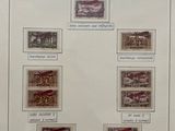a picture of a collection of stamps on display in a glass case