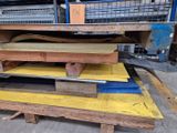several pieces of wood stacked on top of each other on a pallet