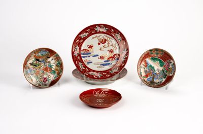four different types of chinese plates and bowls on a white surface