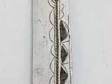 a knife that is sitting on top of a table