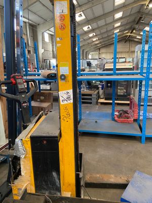a picture of a fork lift in a warehouse