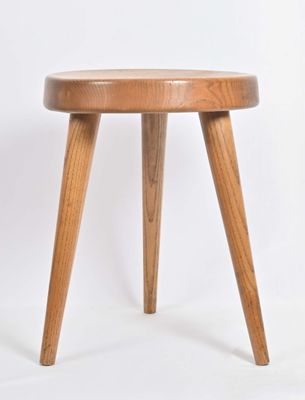 an image of a small wooden stool on a white background