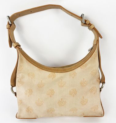 the sak hobo bag in beige and tan floral print