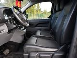 a view of the inside of a truck with the driver ' s seat up