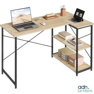 un bureau d'ordinateur sur lequel est posé un ordinateur portable