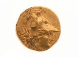 l'image d'une pièce d'or sur laquelle figure une femme