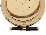 an image of a close up of a watch on a white surface