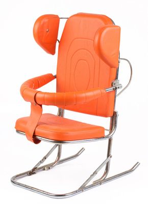 an orange leather chair with a metal frame and arm rests against a white background