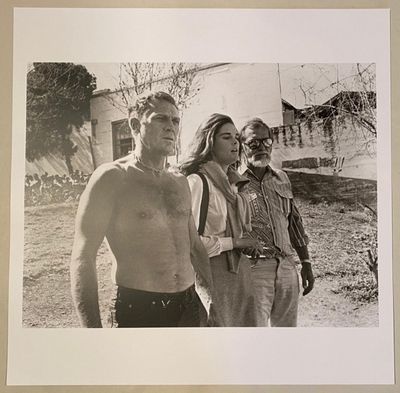 black and white photograph of a man and a woman standing next to each other