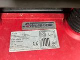 a close up of a hydro gear label on a red vehicle