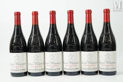 six bottles of red wine are lined up on a white surface
