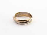 une bague en or et en argent ornée d'une plume
