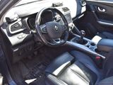 the interior of a car with black leather seats and a steering wheel