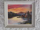 a painting on the wall of a house by the water