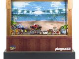 une maquette Playmobil avec une scène de plage en arrière-plan