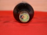 a bottle of wine that is sitting on a table