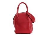 a red handbag with a bow on the handle