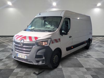 a white van with red stripes parked in a room