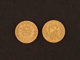 two gold coins, one of which is a sovereign and the other of which is a sovereign