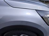 a close up of a car ' s front bumper
