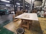an image of a room with a table and chairs in it