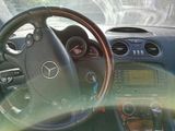 a picture of a car dashboard with a steering wheel