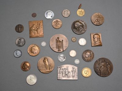 a lot of coins that are sitting on a table