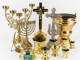 many different types of religious items on the table