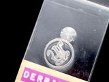 a picture of a badge with a skull on it