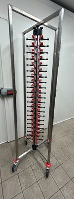 a man that is standing in front of a machine