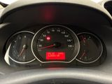 a close up of a car dashboard with a speedometer and gauges