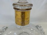 a glass bottle with a clock on top of it