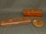 two wooden boxes with handles and a lid on a gray surface