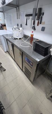 a kitchen with a lot of counter space in it