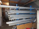 a lot of steel bars stacked on top of each other