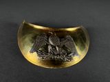 une boucle de ceinture en laiton ornée d'un aigle