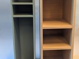 two shelves that are next to each other on a white surface