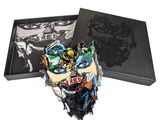 the box is black and has a picture of a man ' s face on it