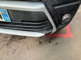 a close up of a car with a license plate on the front of it