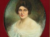 portrait of a woman in a white dress in a red frame